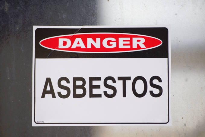 Danger Asbestos Warning Sign on Glass